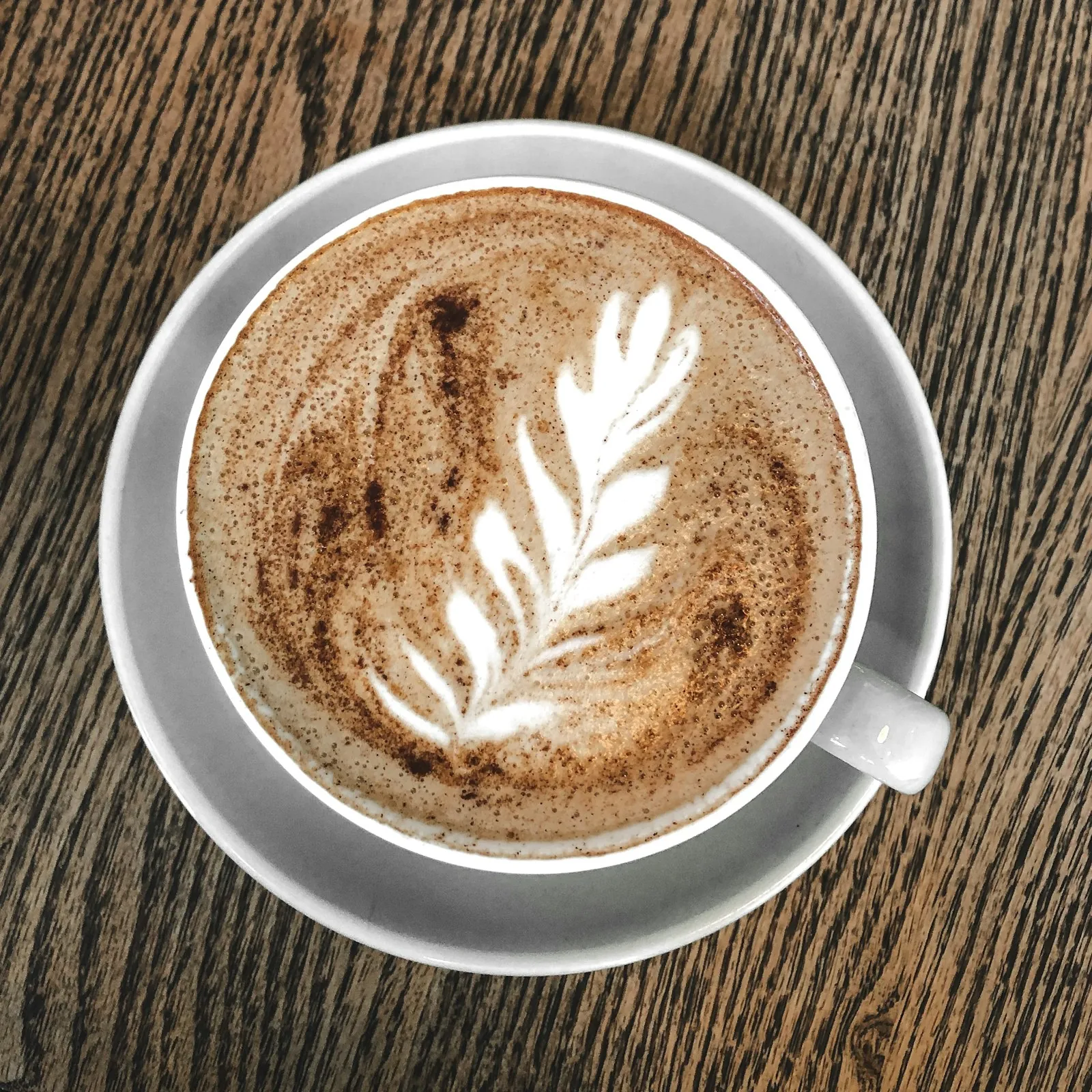 Flat white with latte art, seen from above